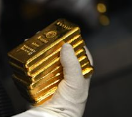 美联储官员淡化加息前景后黄金上涨